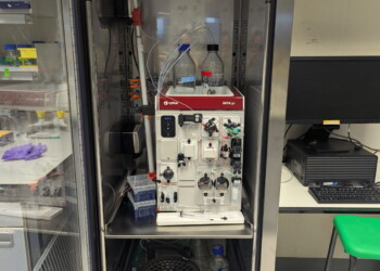 Single door cabinet housing an AKTA Go and F9-R Fraction Collector. This being a bespoke cabinet with 2 double electric sockets mounted on the left hand wall with all power supply hidden inside the wall