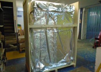 Final crate being built around fully sealed cabinet