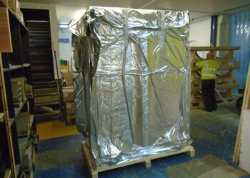 The cabinet is vacuum packed with desiccant, in a foil bag, and hermetically sealed to prevent moisture ingress during transport